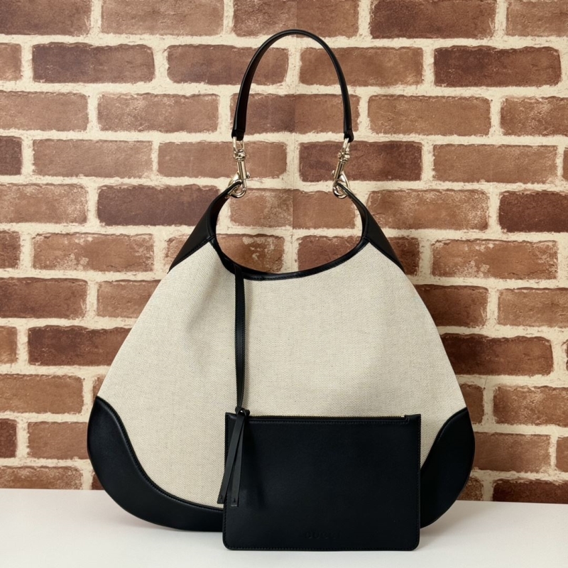 G*u*i top handle bags